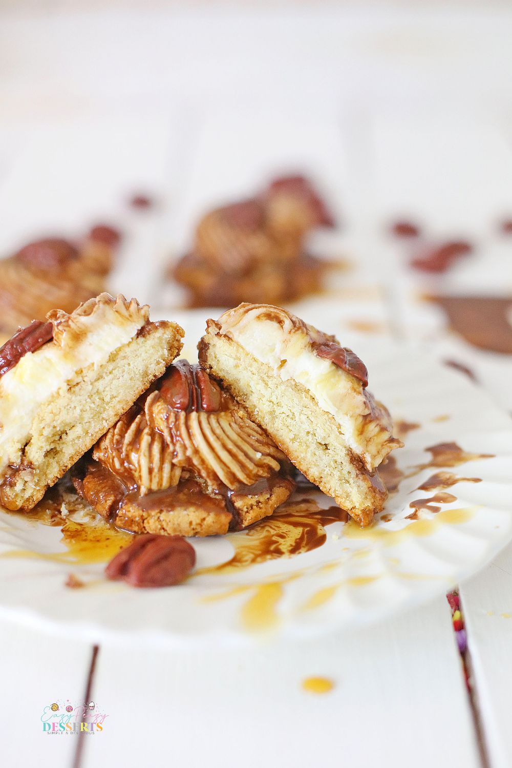 Close up image of turtle cookies with pecans, caramel and chocolate